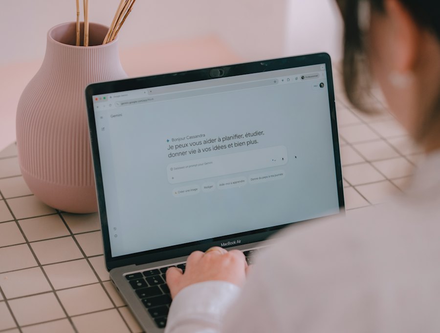 Person typing a query on a laptop
