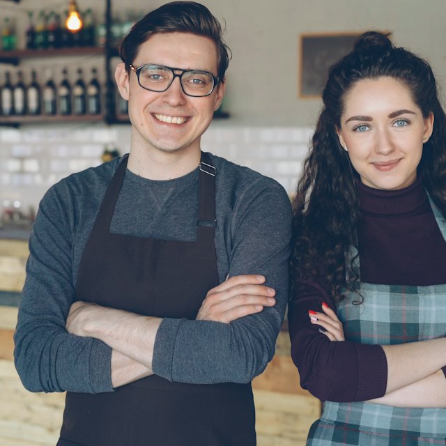 Two cafe owners in their shop